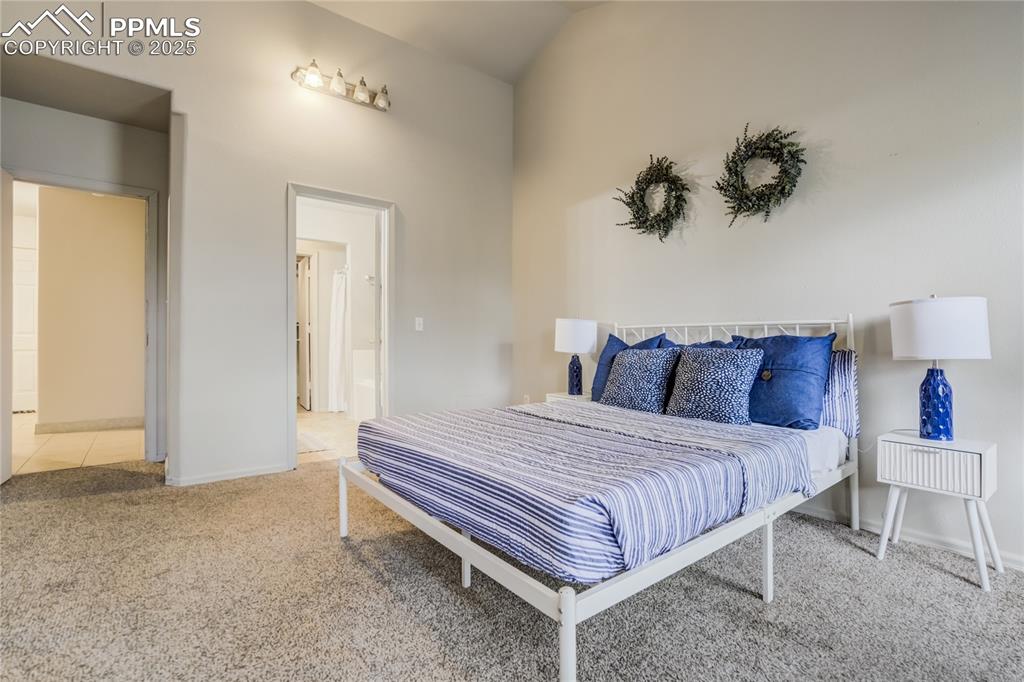 Image 16 of 42: Carpeted bedroom featuring baseboards