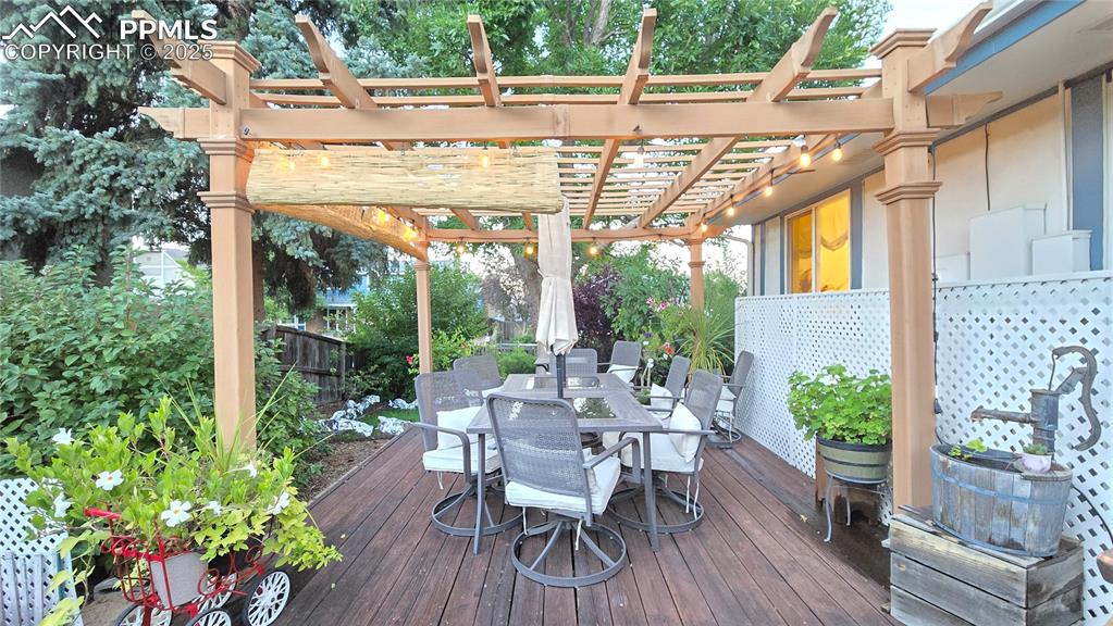 Image 34 of 42: Deck with outdoor dining space