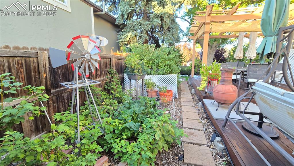 Image 40 of 42: View of yard featuring a pergola