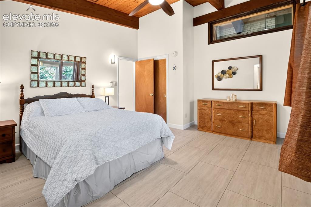 Image 23 of 49: The spacious primary bedroom