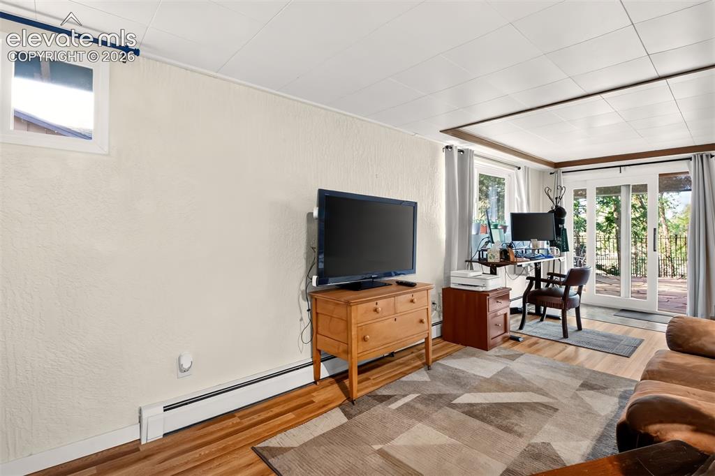Image 34 of 49: A view of the walk out basement living area