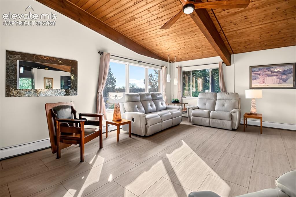 Image 8 of 49: Another view of the main level living room