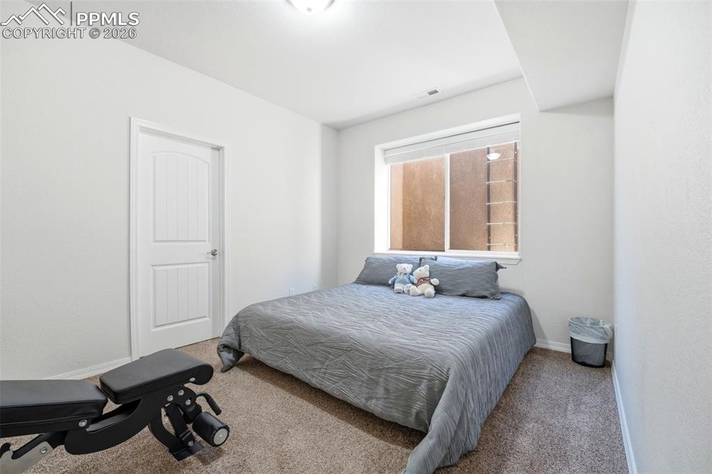 Image 40 of 50: Bedroom