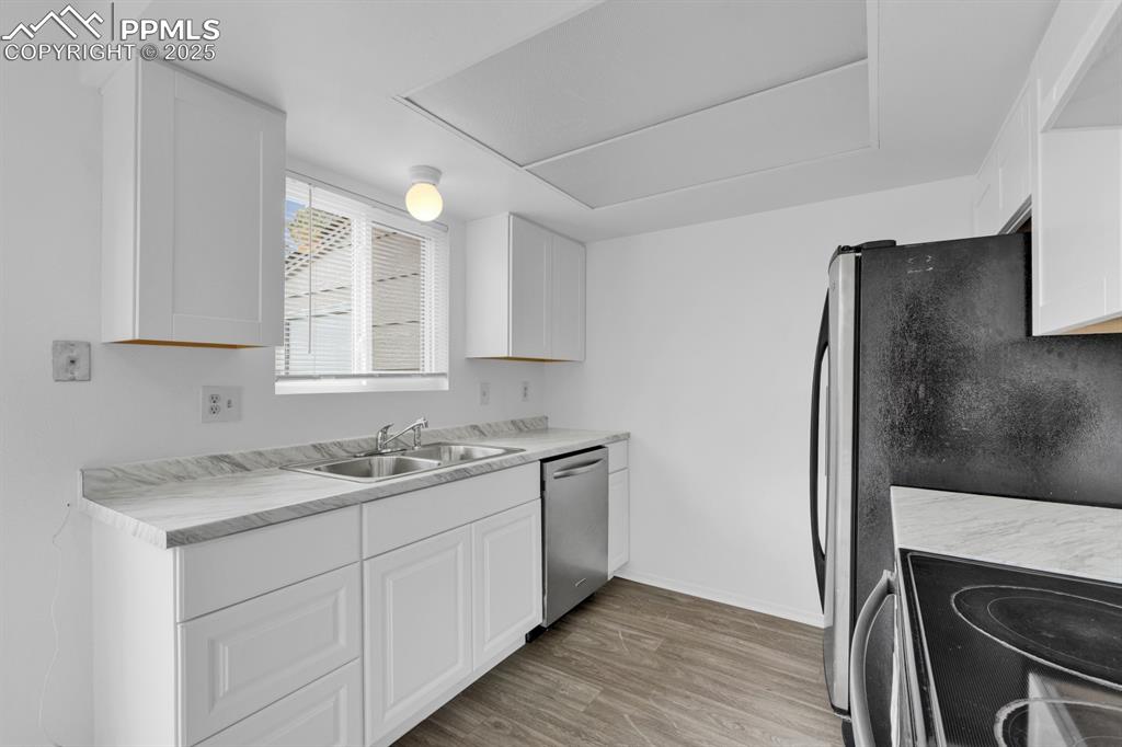 Image 8 of 15: Updated Kitchen with Stainless Steel Appliances