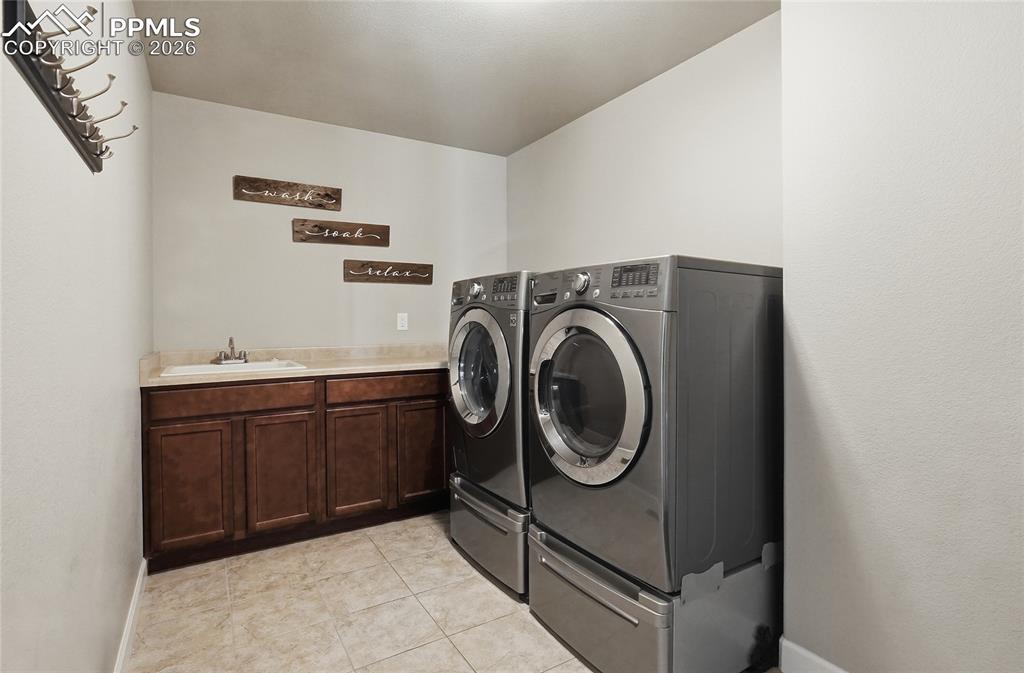 Image 24 of 45: Main Level Laundry Room off garage