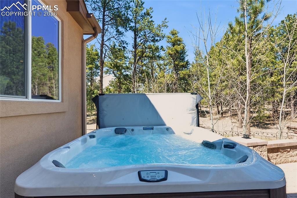 Image 38 of 45: Enjoy the Hot Tub and Outdoor Living Space