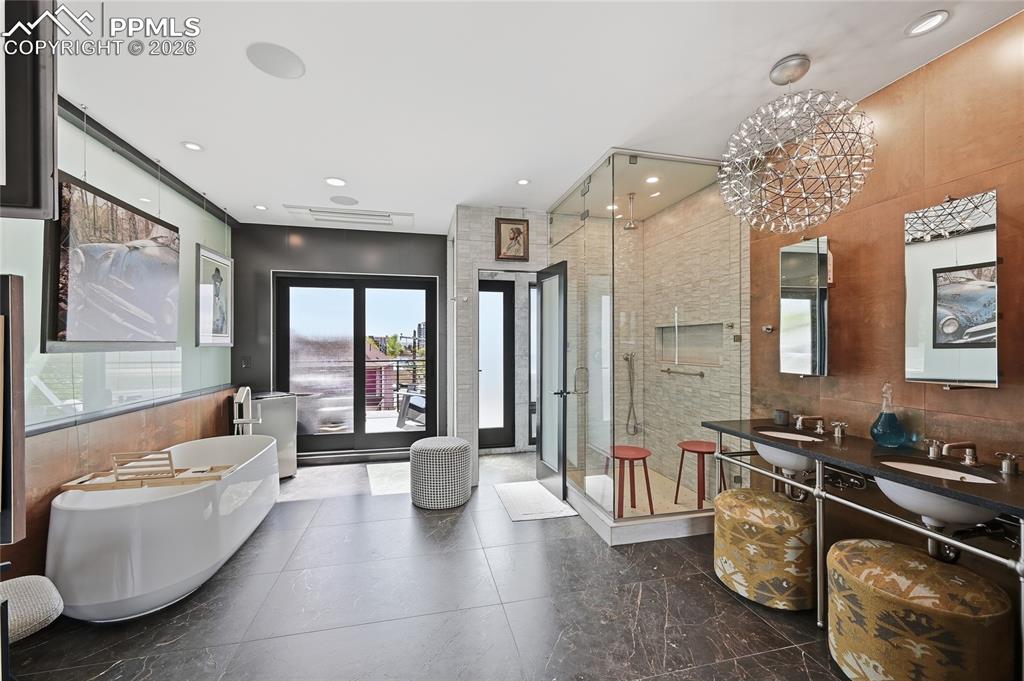 Image 29 of 50: Stairway to Primary Suite