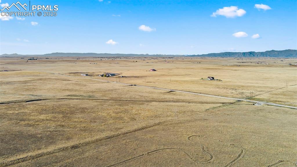 Image 10 of 10: View of rural area featuring mountains
