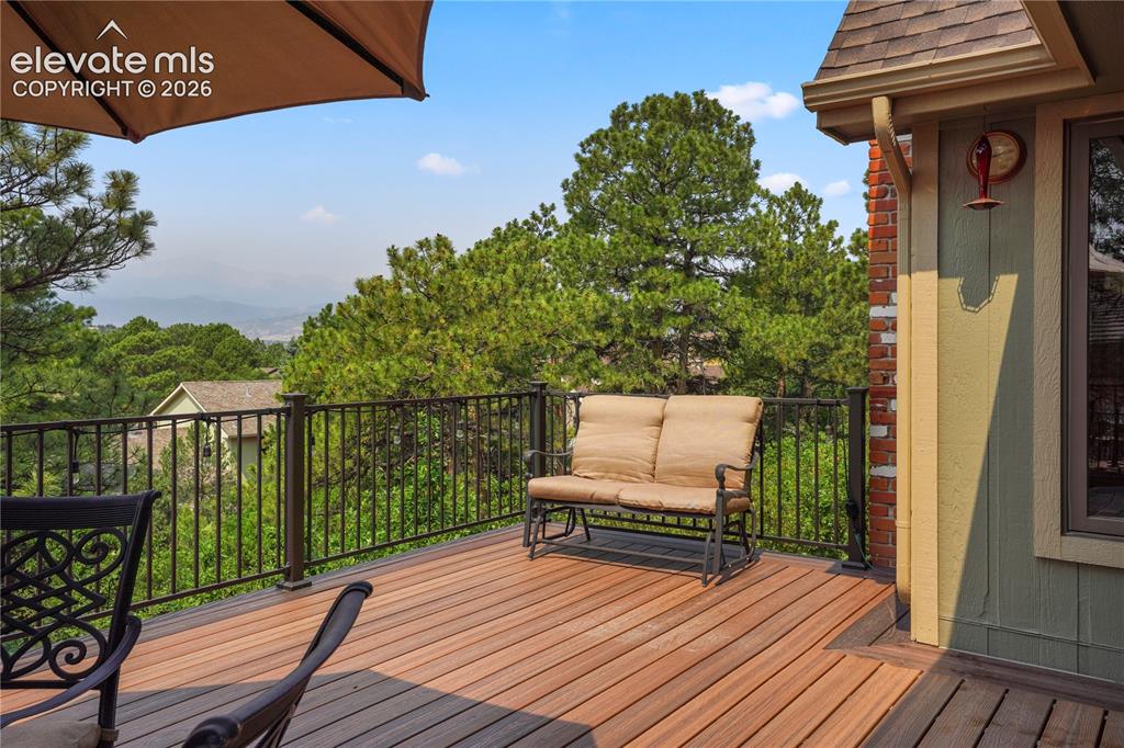 Image 11 of 39: has plenty of space to entertain, jaw-dropping Pikes Peak and mountain view