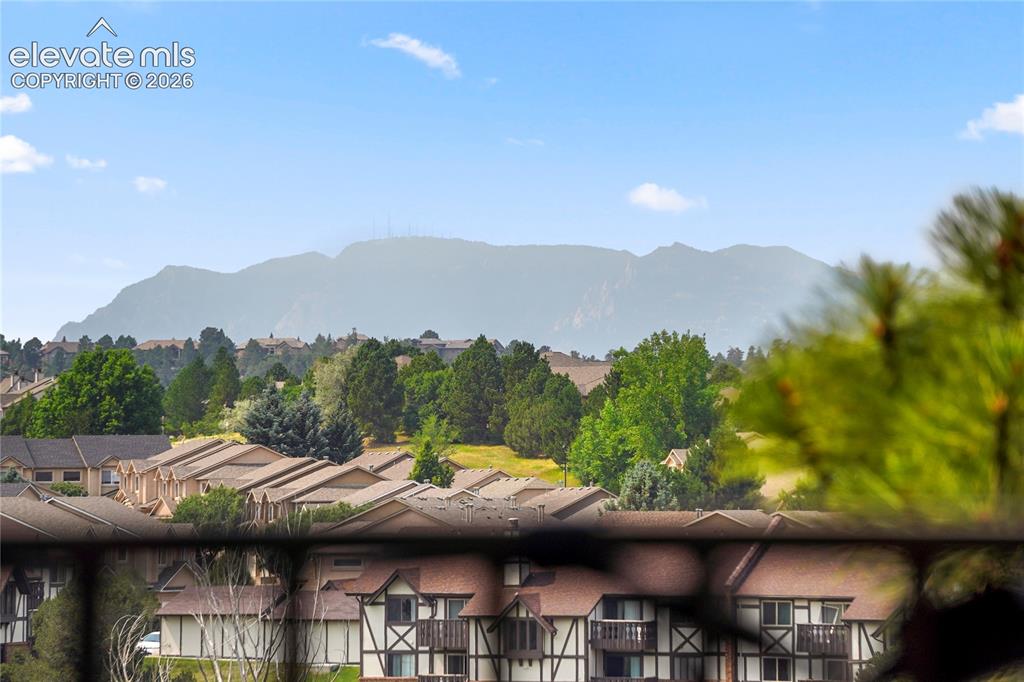 Image 16 of 39: View looking southwest from back of home.