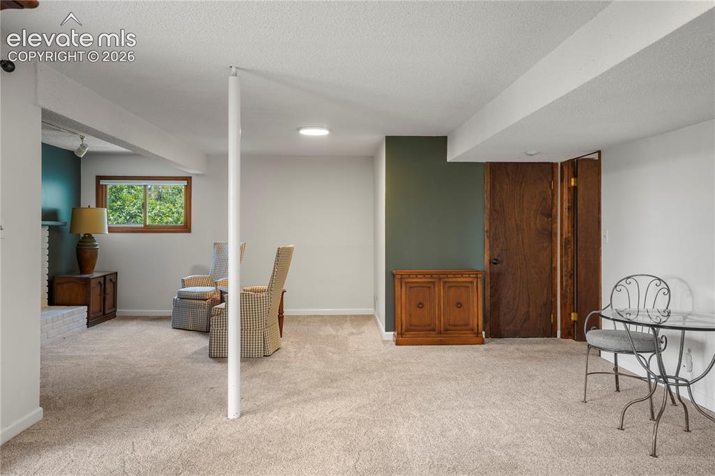 Image 29 of 39: family/rec room area and...