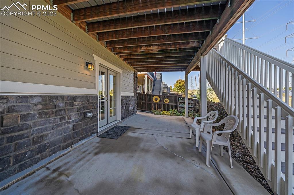 Image 39 of 49: View of patio / terrace featuring french doors