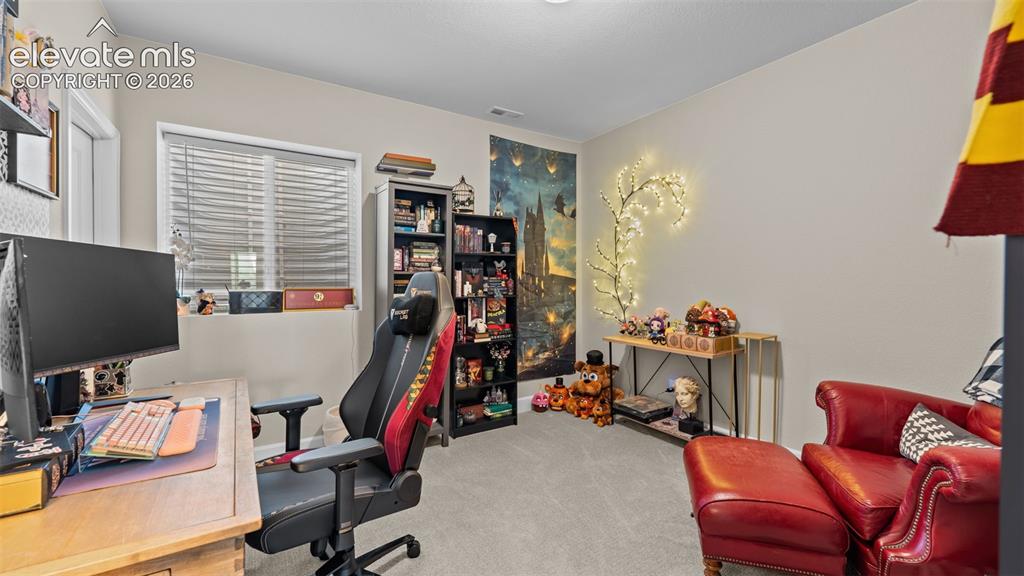 Image 33 of 46: Wall-to-wall carpeting and neutral wall tones