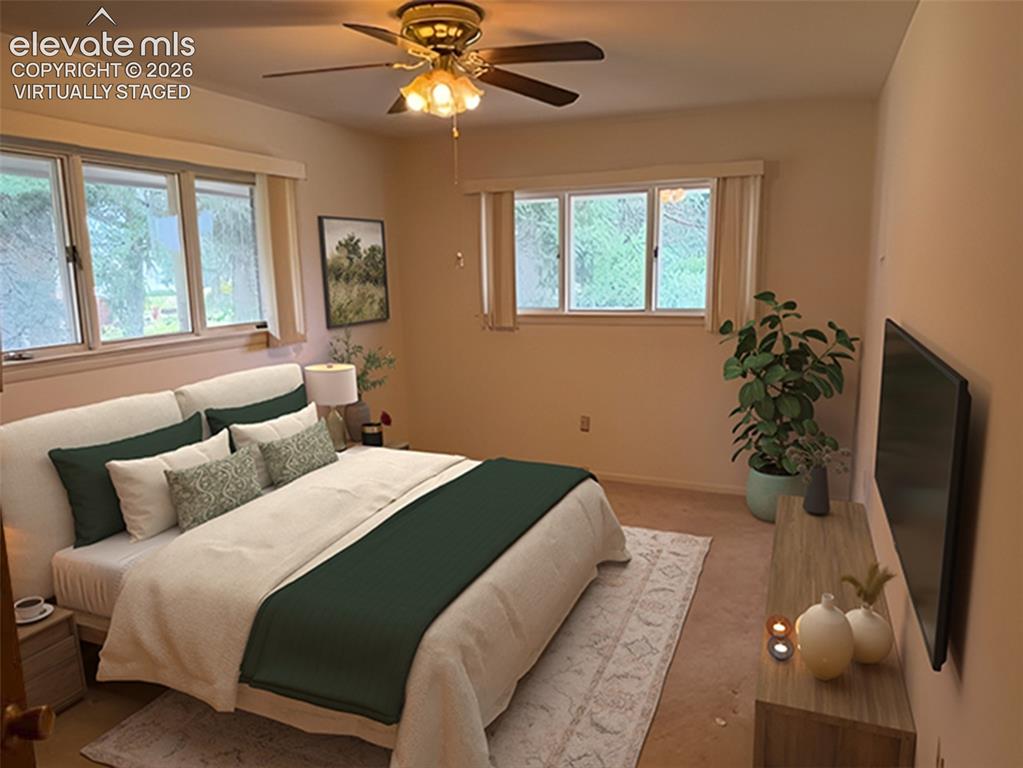 Image 11 of 27: Virtually staged bedroom #2 (main level)