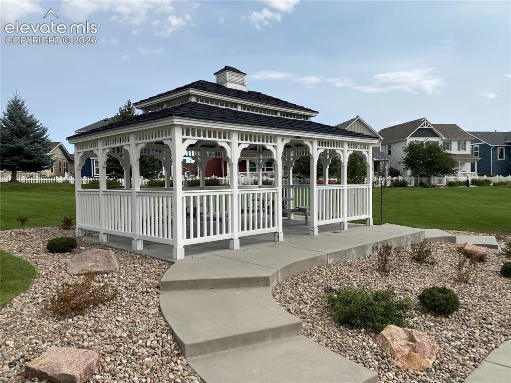 Image 39 of 40: Enjoy the gazebo in the park, offering a picturesque spot for dining, socia