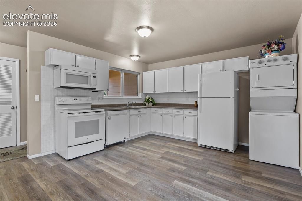 Image 8 of 26: with LVP flooring