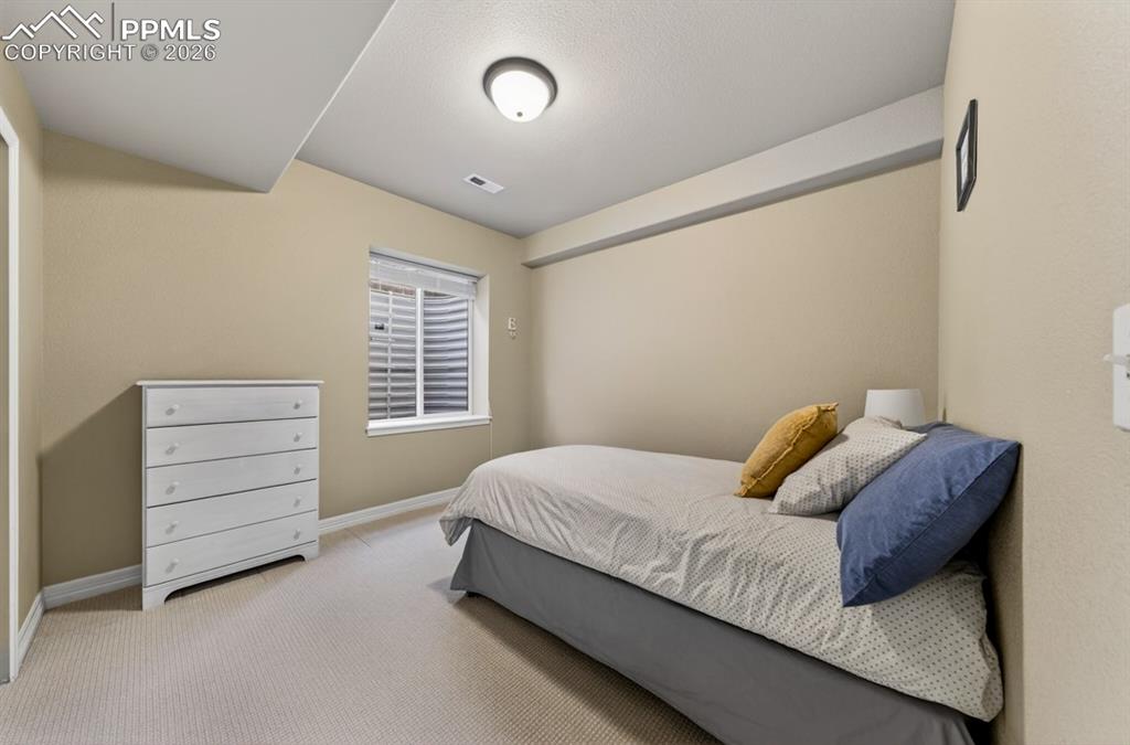 Image 28 of 47: One of 3 bedrooms in lower level