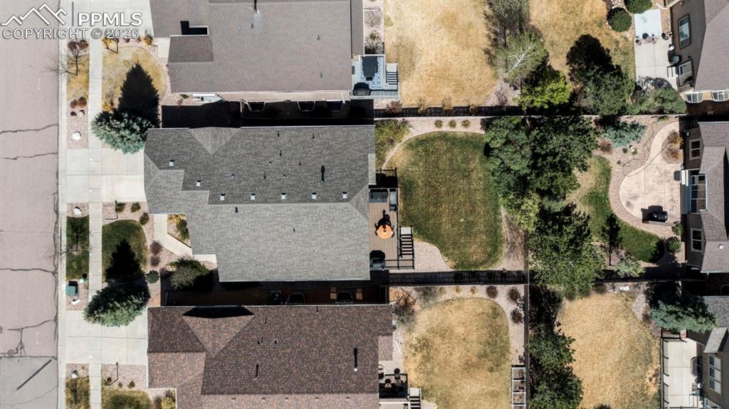 Image 4 of 47: Overhead view of a residential property featuring a private rear deck, and 