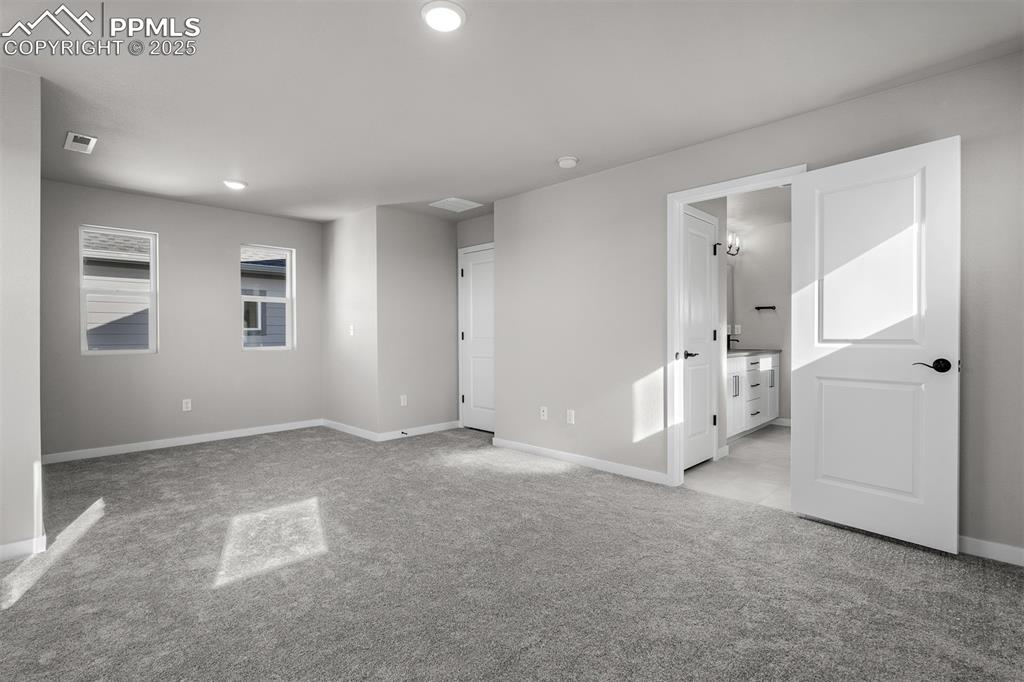 Image 18 of 32: Master Bedroom