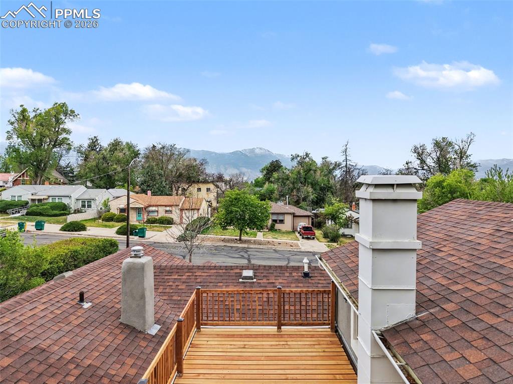 Image 25 of 44: Rooftop deck with mountain views