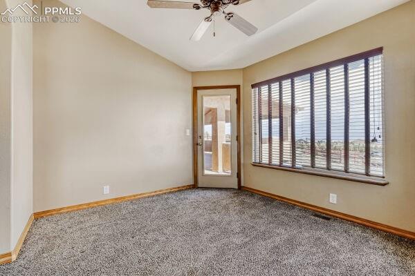 Image 16 of 31: Primary Room Retreat with vaulted ceilings, plush carpeting, and a ceiling