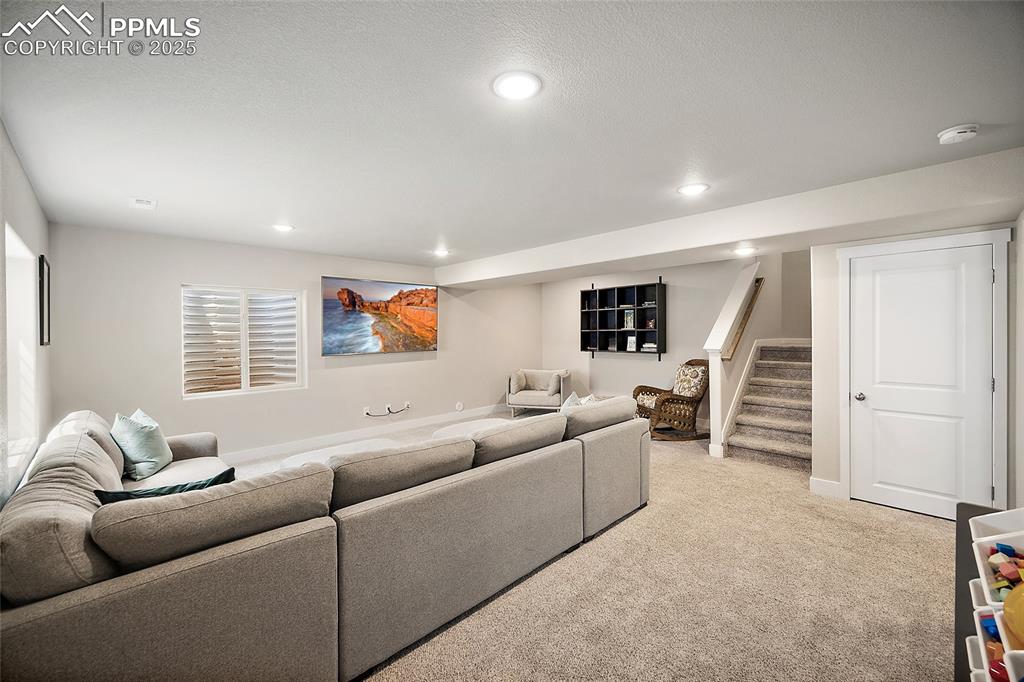 Image 29 of 40: Spacious basement theater