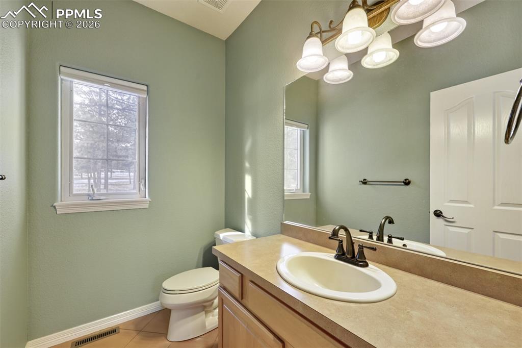 Image 14 of 50: Main Level 1/2 bathroom