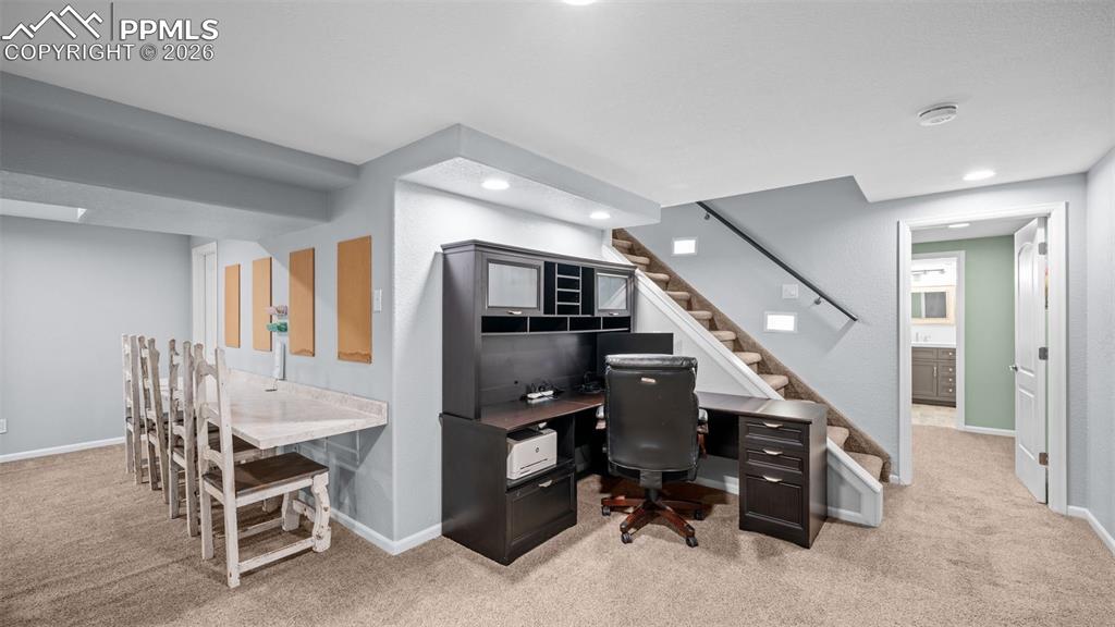 Image 23 of 44: Home office featuring light carpet and recessed lighting