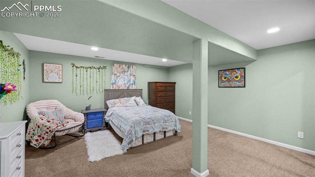 Image 25 of 44: Bedroom featuring carpet floors and recessed lighting