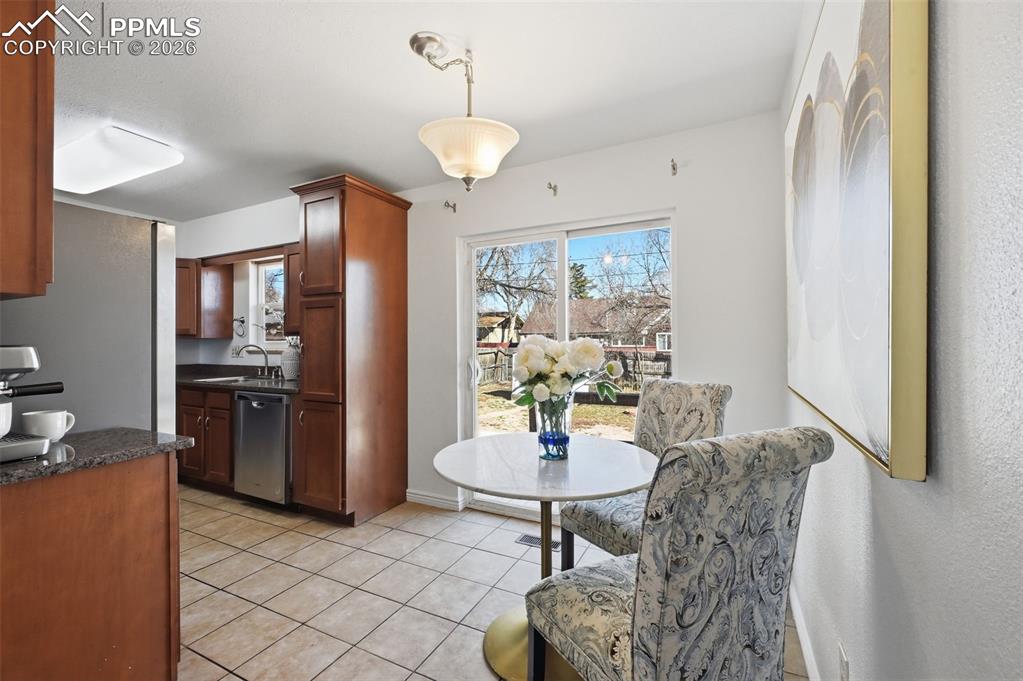 Image 12 of 32: Walks out to the back patio