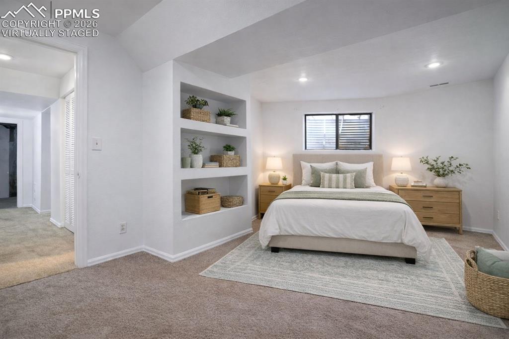 Image 37 of 50: Virtually Staged - This bedroom has been used as second primary and feature