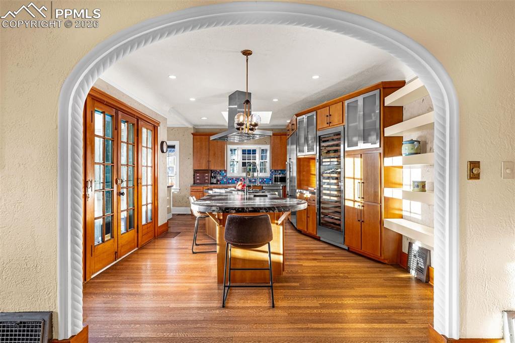 Image 12 of 50: Arched entryways with fine detailing