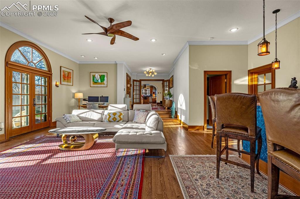 Image 13 of 50: Expansive Great Room/Living Room with gorgeous natural light