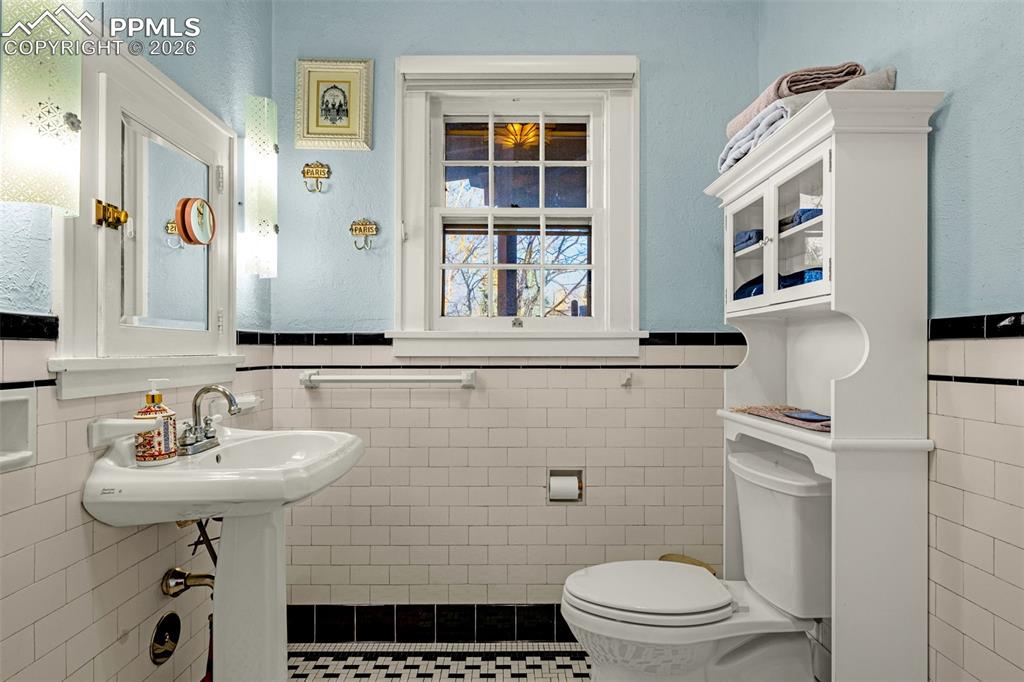 Image 34 of 50: Gorgeous design and original tile work