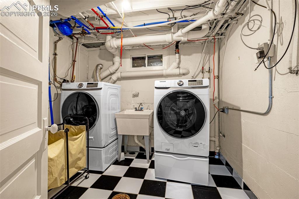Image 43 of 50: Laundry Room with sink