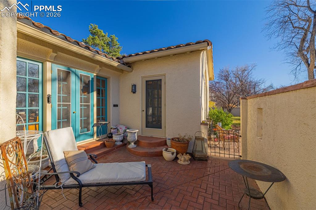 Image 47 of 50: A private little sanctuary off the kitchen & dining rooms