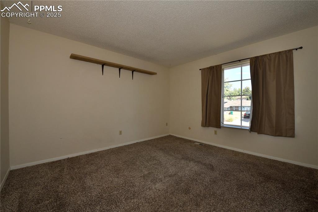 Image 10 of 21: Bedroom