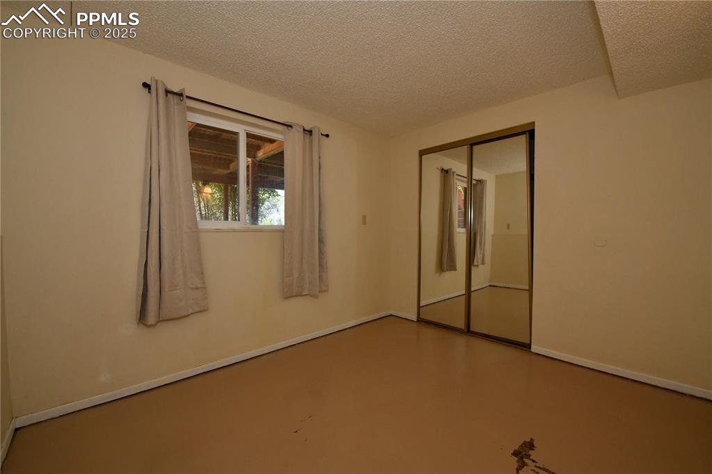 Image 13 of 21: Bedroom