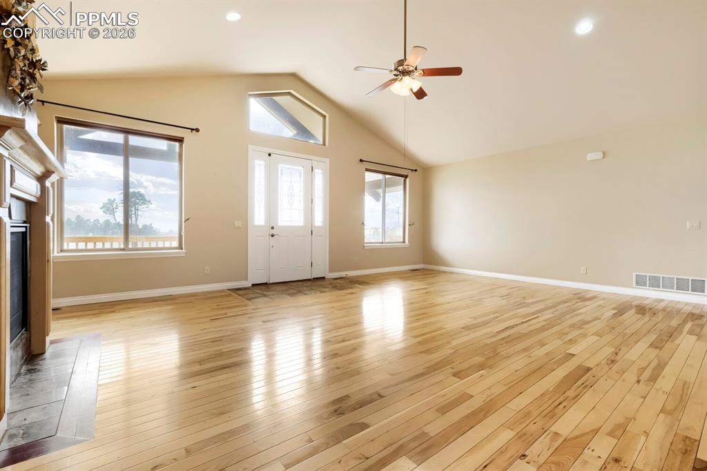 Image 12 of 48: On clear sunny days, the right great room window offers beautiful Pikes Pea