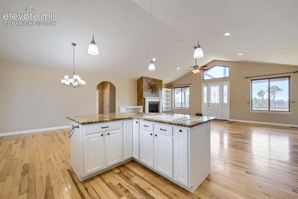 Image 19 of 47: Kitchen island adds additional storage to the high volume storage space in