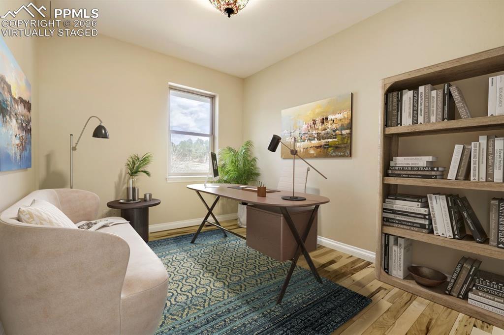 Image 25 of 48: Virtually Staged. This large office rests beside the master bedroom.