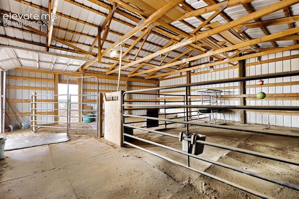 Image 38 of 47: Large enclosed barn equipped with two stalls and the opportunity to add mor