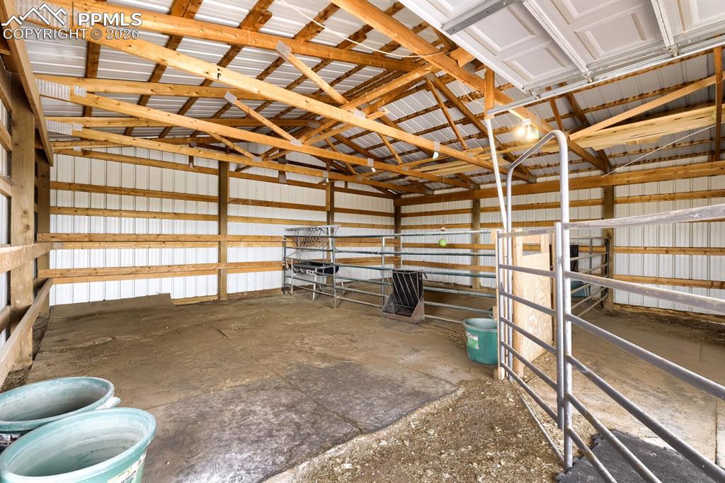 Image 40 of 48: First stall equipped with heated watering device, hay feeder and 4H hoof pa