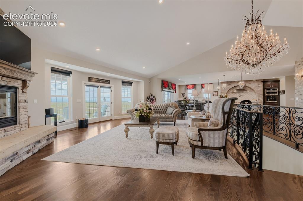 Image 11 of 50: Overlooks the land with exquisite fireplace