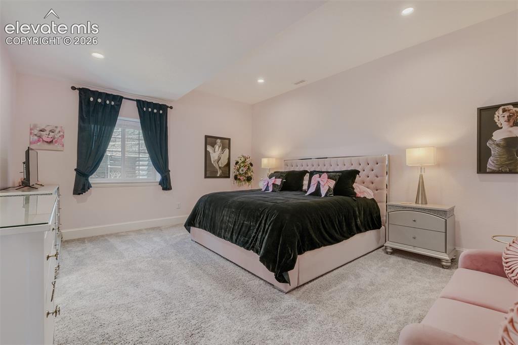Image 39 of 50: 1 of 3 basement bedrooms/each an en suite