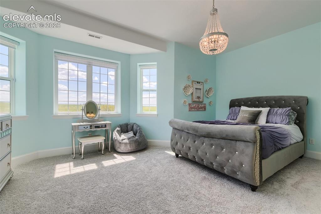 Image 40 of 50: 2 of 3 basement bedrooms/private bahts