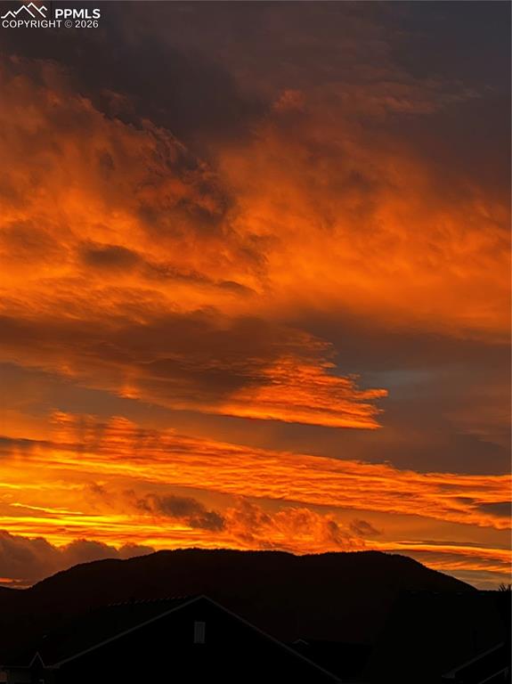 Image 37 of 38: Sunsets and mountain views