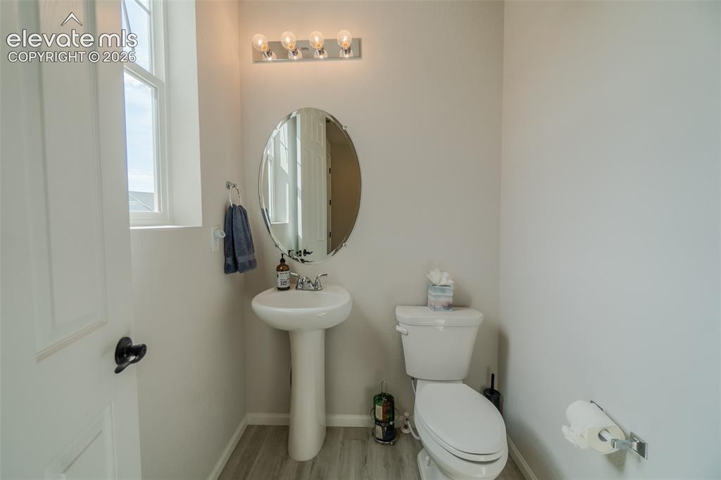 Image 14 of 35: Main level powder room 