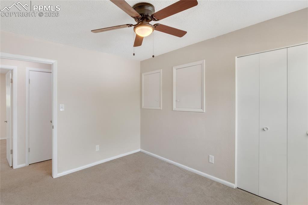Image 14 of 31: Second Bedroom with additional storage