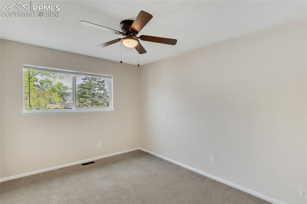 Image 15 of 31: Second bedroom with additional storage